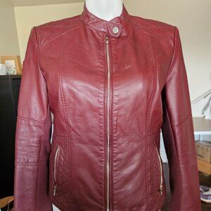 Red faux leather jacket.